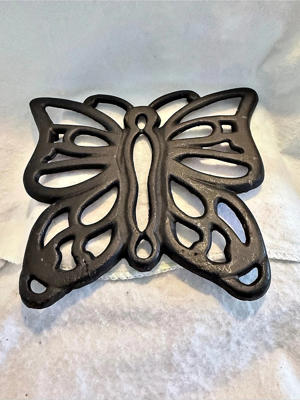 Black iron butterfly trivet